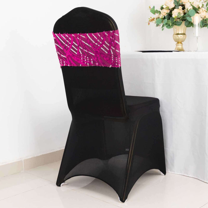 Black chair with vibrant pink patterned backrest against a white backdrop.