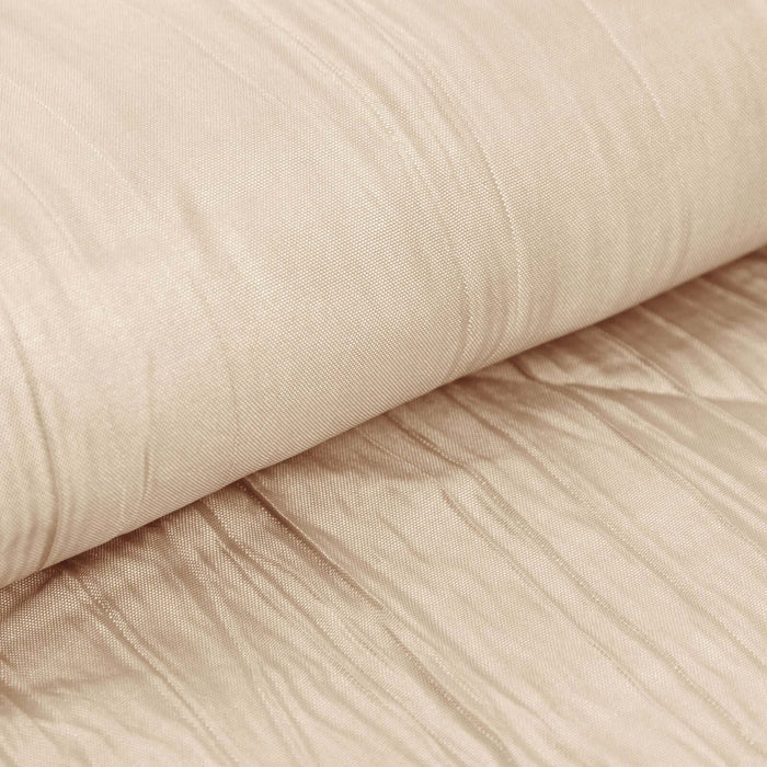 Beige textured fabric roll with fine creases and smooth surface.