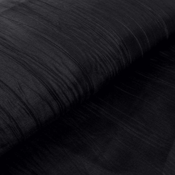 Black sheer fabric with textured stripes for crafting and fashion projects.