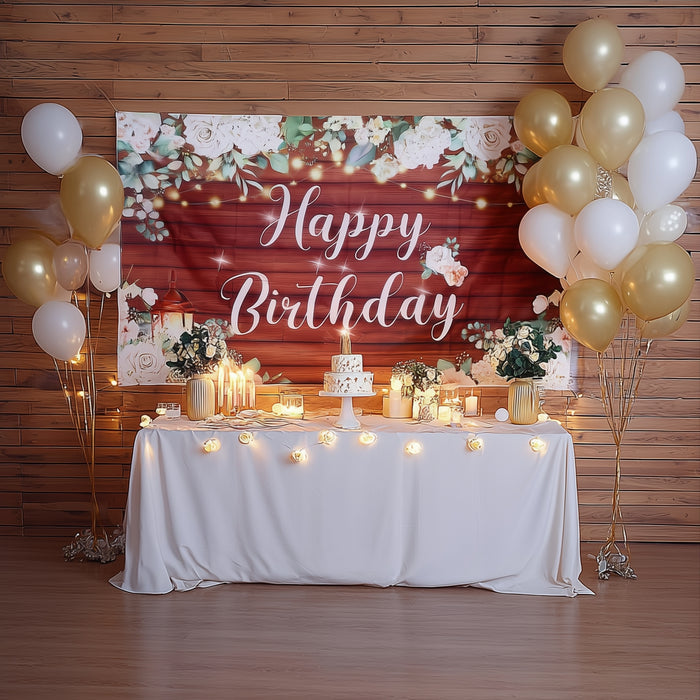 Birthday party setup with decorations, cake, and balloons in warm colors.