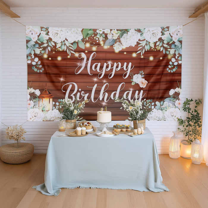 Birthday celebration backdrop with floral design and "Happy Birthday" text.