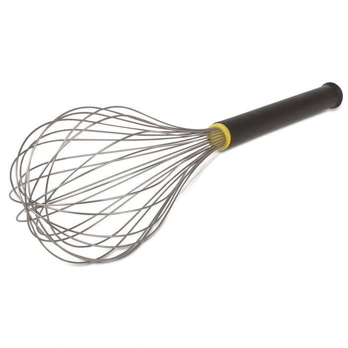 A stainless steel balloon whisk with a black handle and yellow detailing.