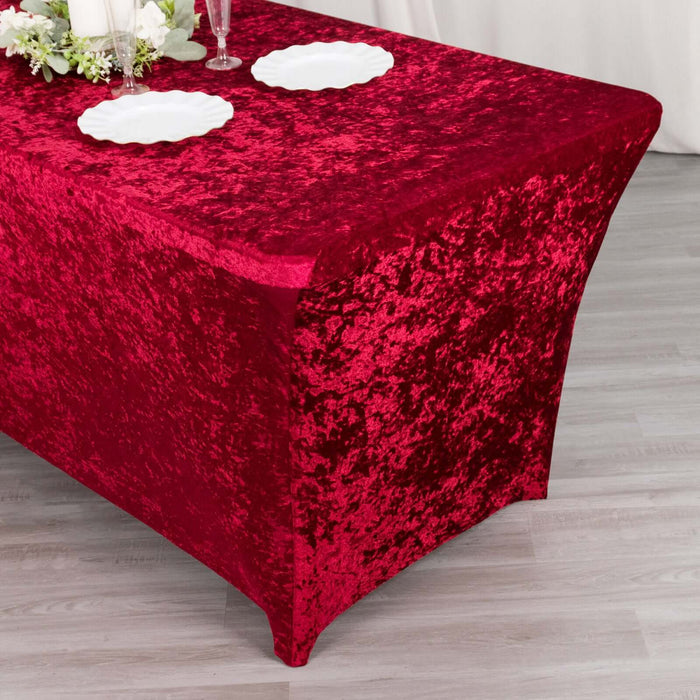 Red velvet table cover for elegant dining settings.