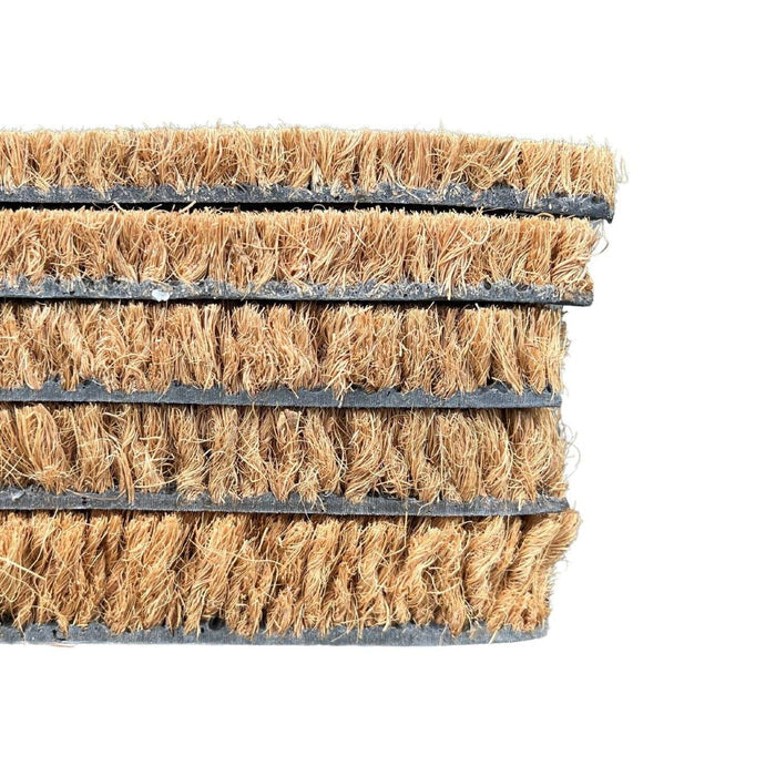 Coir doormat with a black border on a white background