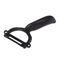 A black Kyocera ceramic peeler with a swivel ceramic blade and a plastic handle.