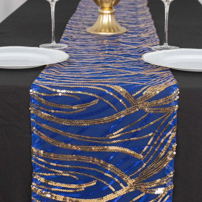 Blue and gold sequined table runner on a black table with plates and glasses.