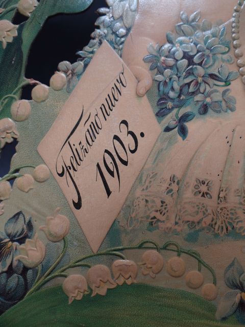 Mexican Calendar Chromo: La Ciudad de Mexico-Lady with a Cherub on her Shoulder