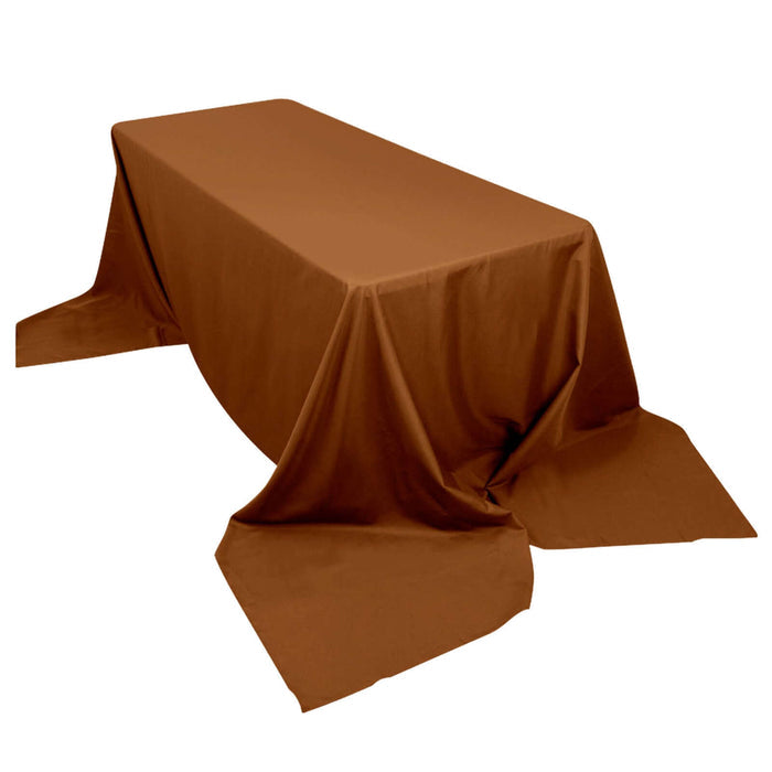 Brown tablecloth draped elegantly over a table in studio-style shot