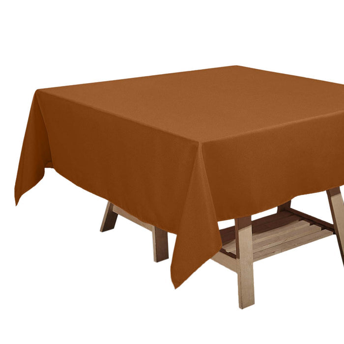 Brown tablecloth draping over a wooden table