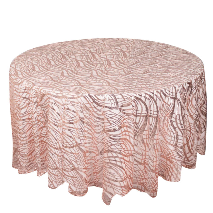 Round tablecloth with a pink and white wave pattern.