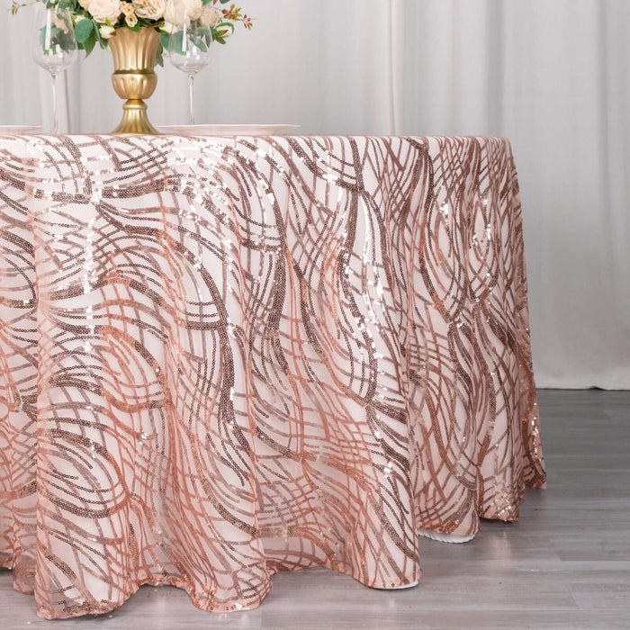Rose gold sequin tablecloth draped elegantly on a table.