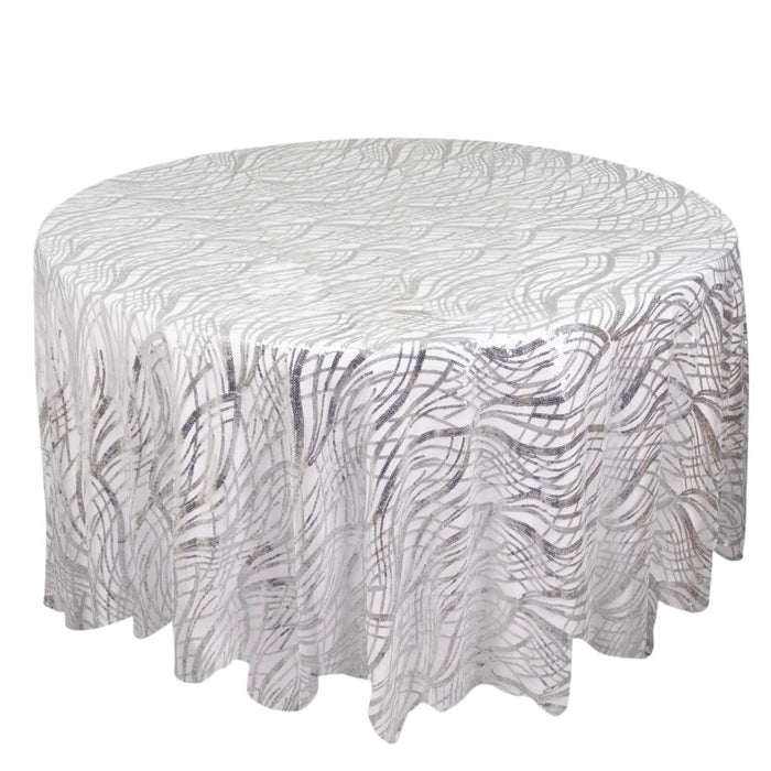 Round tablecloth with elegant wave pattern in white and silver tones