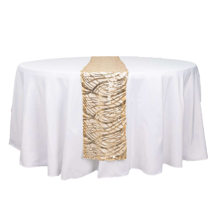Gold sequined table runner on a white tablecloth.