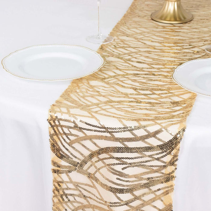Gold and silver decorative table runner on a white tablecloth