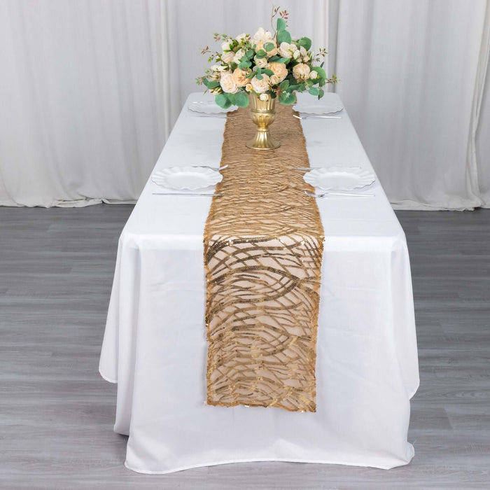 Elegant gold table runner on a white table with floral centerpiece.
