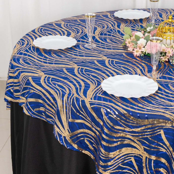 Blue and gold patterned tablecloth draped elegantly on a round table.