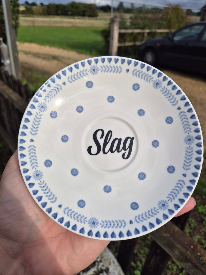 Slag polka dot saucer