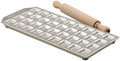 A square ravioli maker mold with 36 forms, accompanied by a wooden rolling-pin. The mold is made of aluminum with a steel base, and it's silver in color.