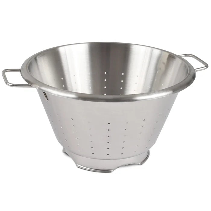Stainless steel colander on a white background