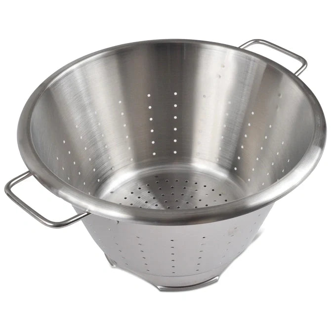Stainless steel colander on a white background