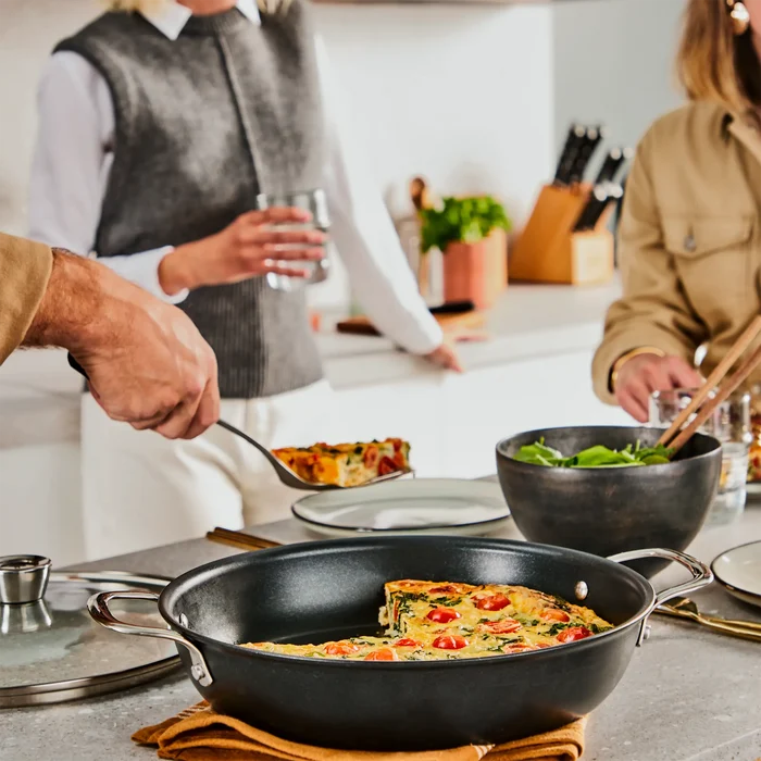 Tefal Excellence+ Induction FusionCore Non-Stick All-In-One Pan 28cm + Lid on kitchen bench