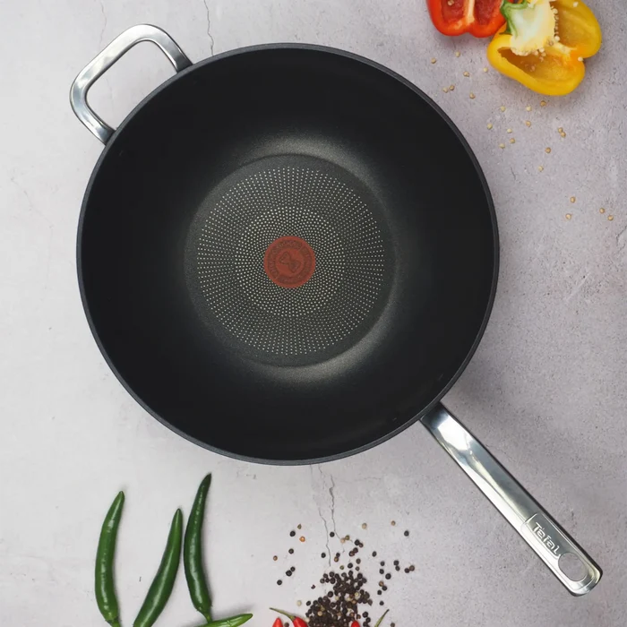 Tefal Premium Specialty Hard Anodised Induction Non-Stick Wok 32cm + Lid on kitchen bench