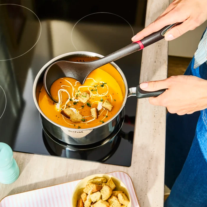Tefal Space+ Everyday Chef Induction Stainless Steel Saucepan + Lid on induction cooktop with soup