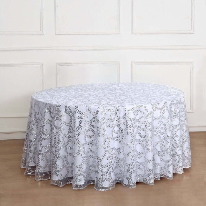 Round white lace tablecloth with intricate floral patterns.