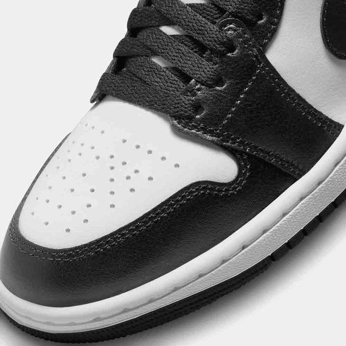 Up close, front view of the Women's Air Jordan 1 Mid.